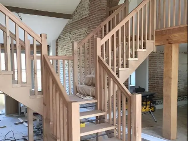 Twin-flight oak staircase under construction